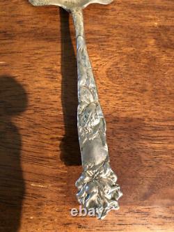 Antique solid sterling cake server. Extremely old one. Beautiful design work. 132