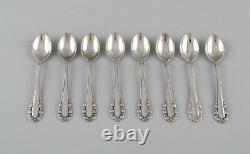 Eight Georg Jensen Lily of the Valley coffee spoons in sterling silver