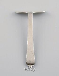 Georg Jensen Pyramid child's pusher in sterling silver. Dated 1933-44