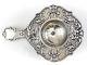 German Sterling Silver Tea Strainer. Pierced And Repousse Floral, Cherub, C1900