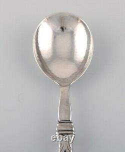 Rare Georg Jensen serving spoon in all sterling silver. Design 102. Dated 1930