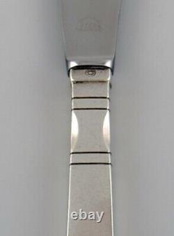Twelve Georg Jensen Continental lunch knives in sterling silver