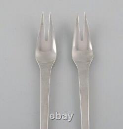 Two Georg Jensen Caravel cold meat forks in sterling silver