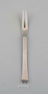 Two Georg Jensen Pyramid cold meat forks in sterling silver. 1930s