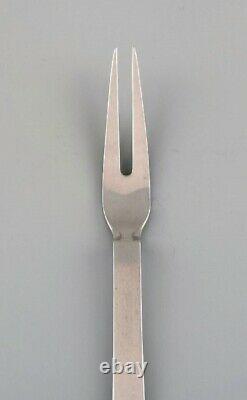 Two Georg Jensen Pyramid cold meat forks in sterling silver. 1930s