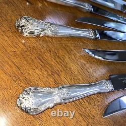 12 couteaux à steak décoratifs à manche en argent sterling