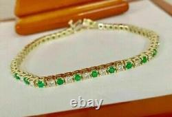 Bracelet de tennis plaqué or jaune 14 carats avec émeraude verte ronde de 8 carats et diamant blanc